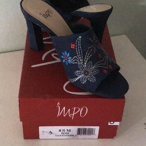 Impo talent embroidered denim mules.